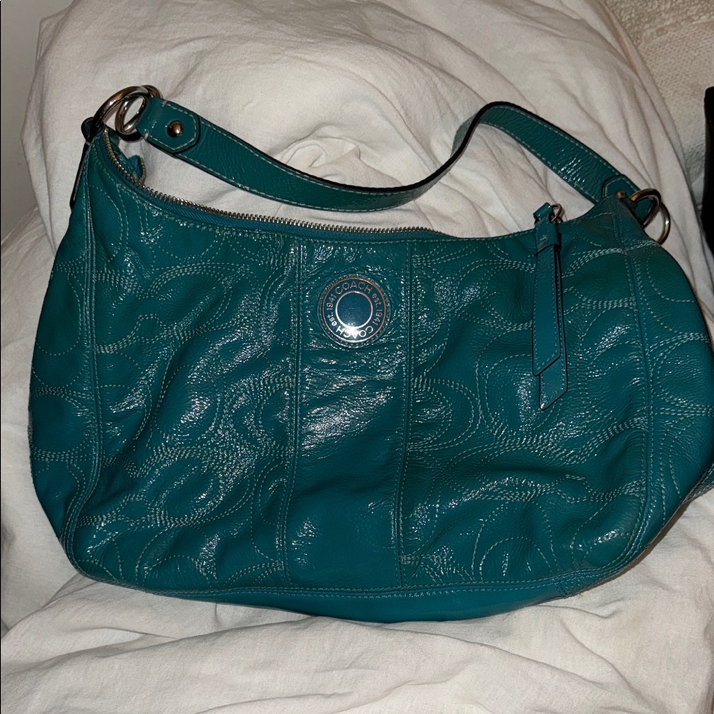 Coach Blue Shoulder Bag with Crescent Shape and Textured Leather